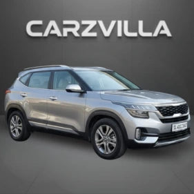 Silver SUV on a gray background with 'CARZVILLA' branding.