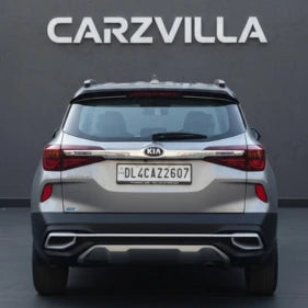 Back view of a silver SUV with 'CARZVILLA' branding on a dark background