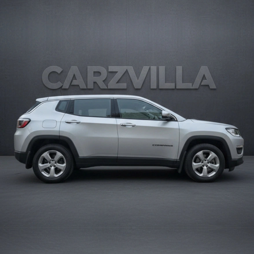 White SUV on a dark gray background with 'CARZVILLA' branding.