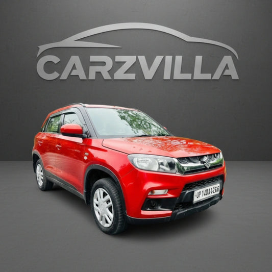 Red car on a gray background with 'CARZVILLA' logo above