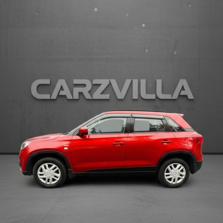 Red SUV on a gray background with 'CARZVILLA' branding.