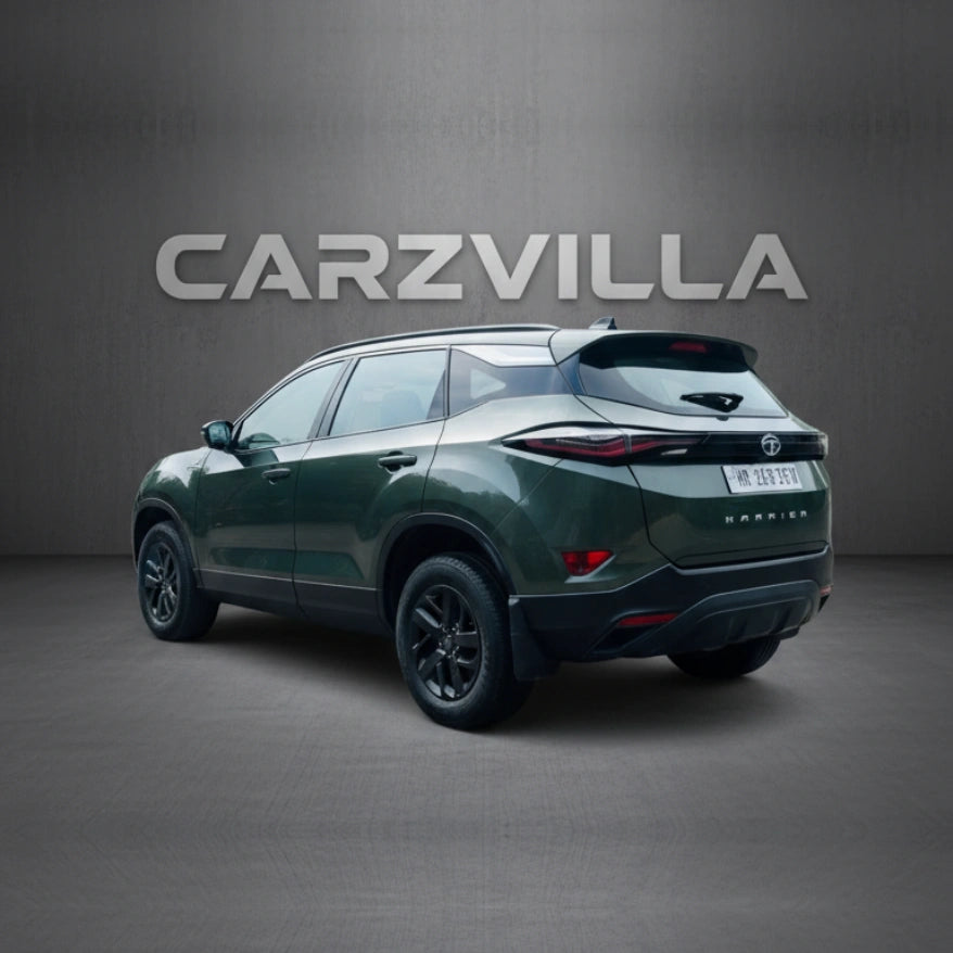 Green SUV on a gray background with 'CARZVILLA' branding.