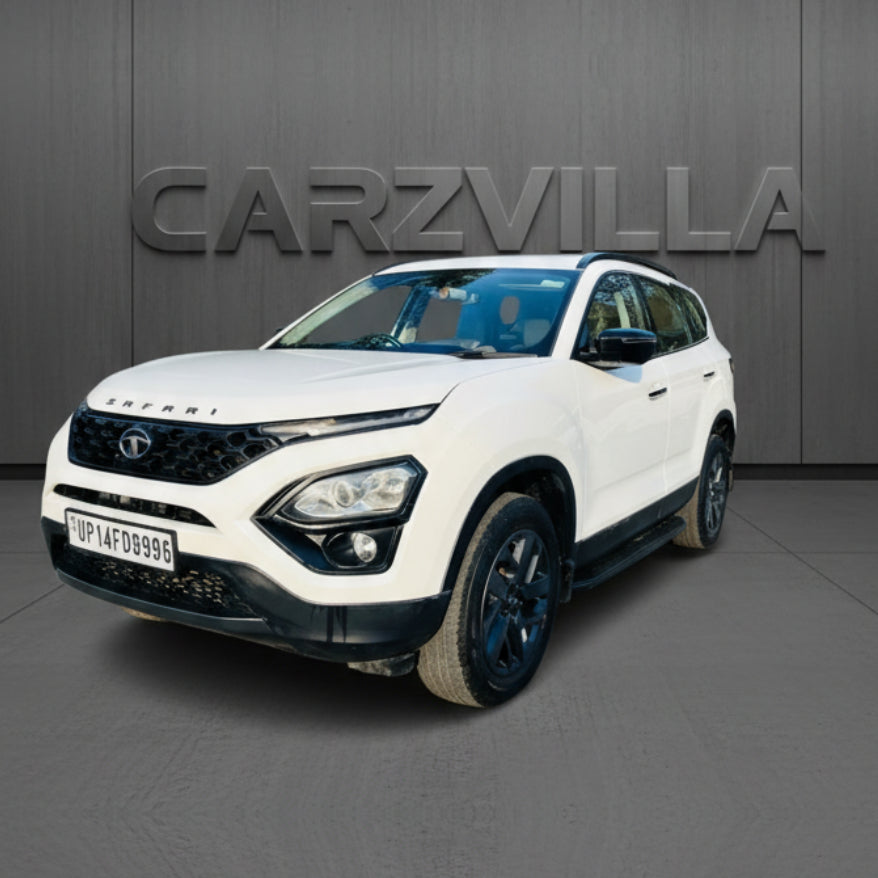 White SUV with black accents on a gray background, featuring the Carzvilla logo.