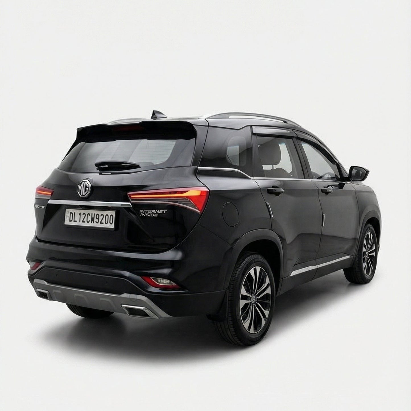 Black SUV shown from a rear three-quarter angle on a white background