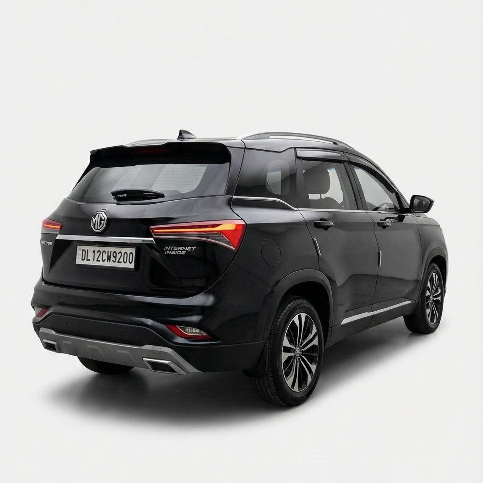 Black SUV shown from a rear three-quarter angle on a white background