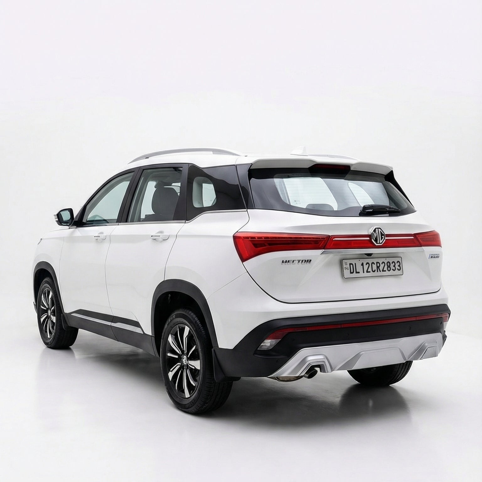 White SUV with red accents on a white background