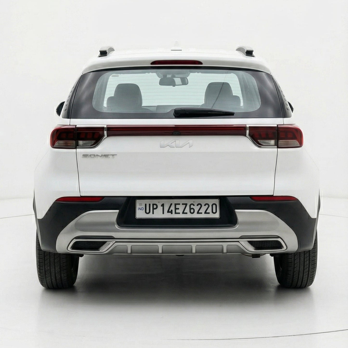 White SUV with a visible license plate on a white background