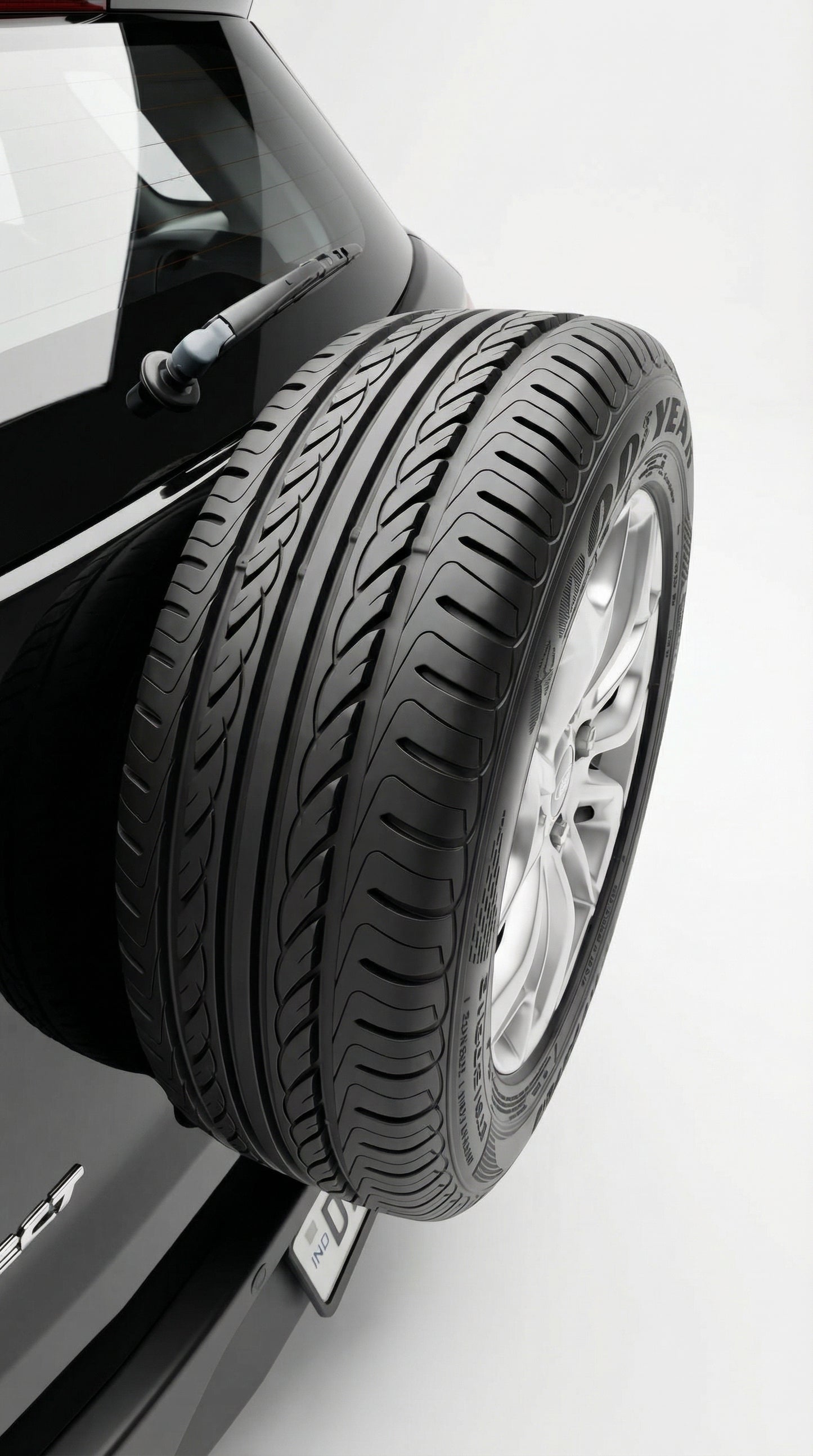 Car tire with rim on a white background