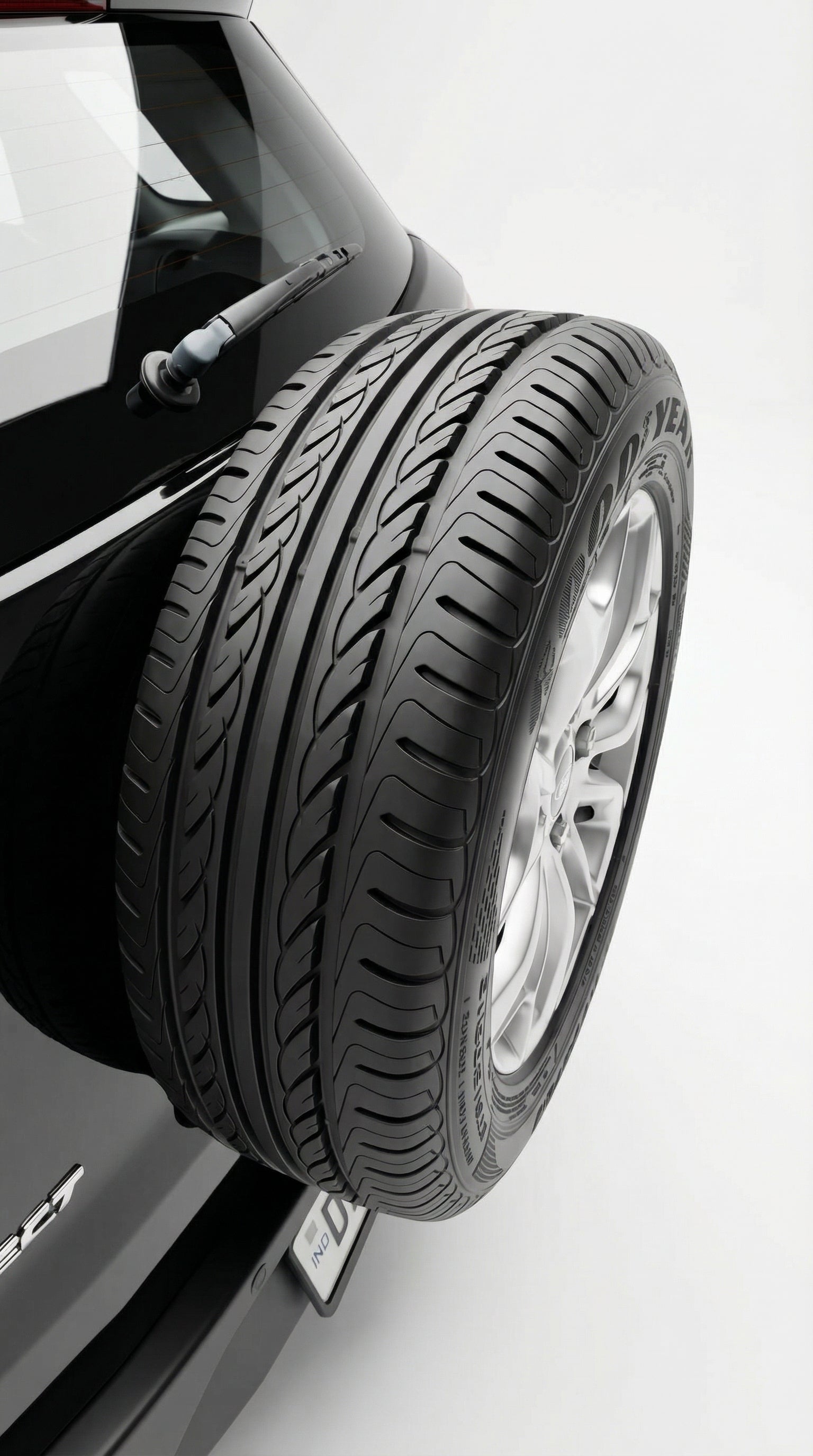 Car tire with rim on a white background