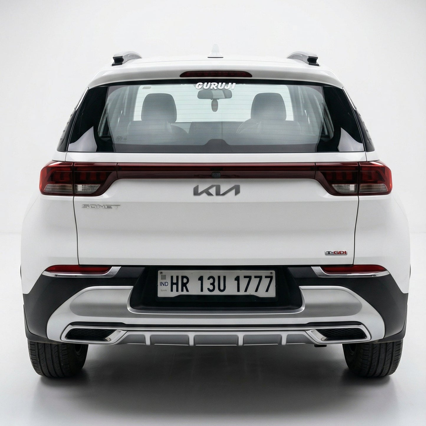 Back view of a white Kia car on a white background