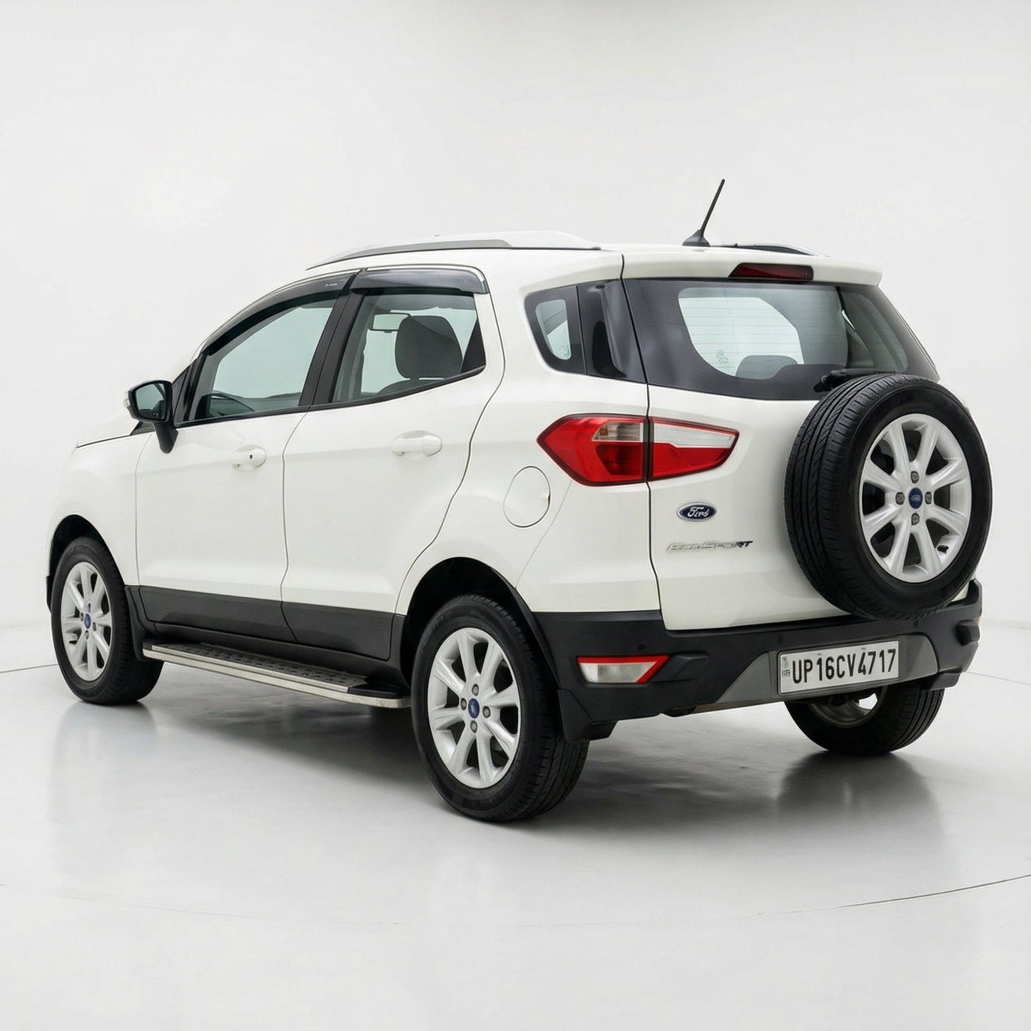 White SUV with spare tire on a white background