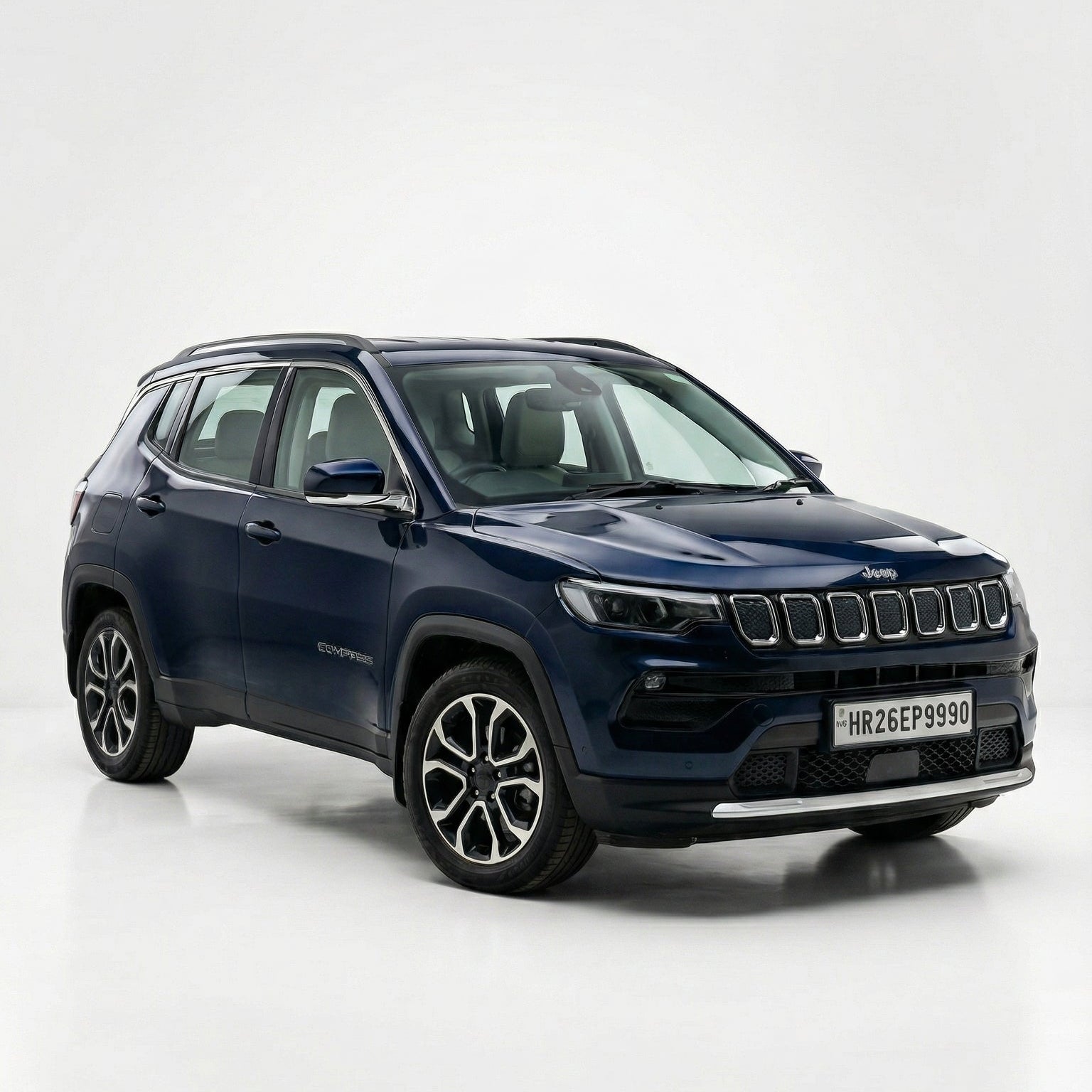 Blue SUV on a white background