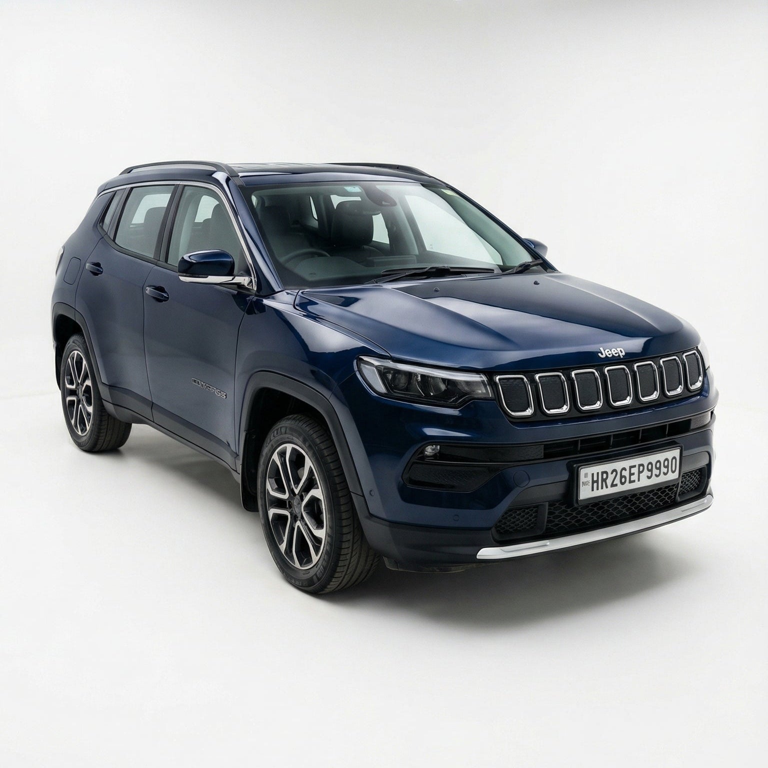 Blue SUV on a white background