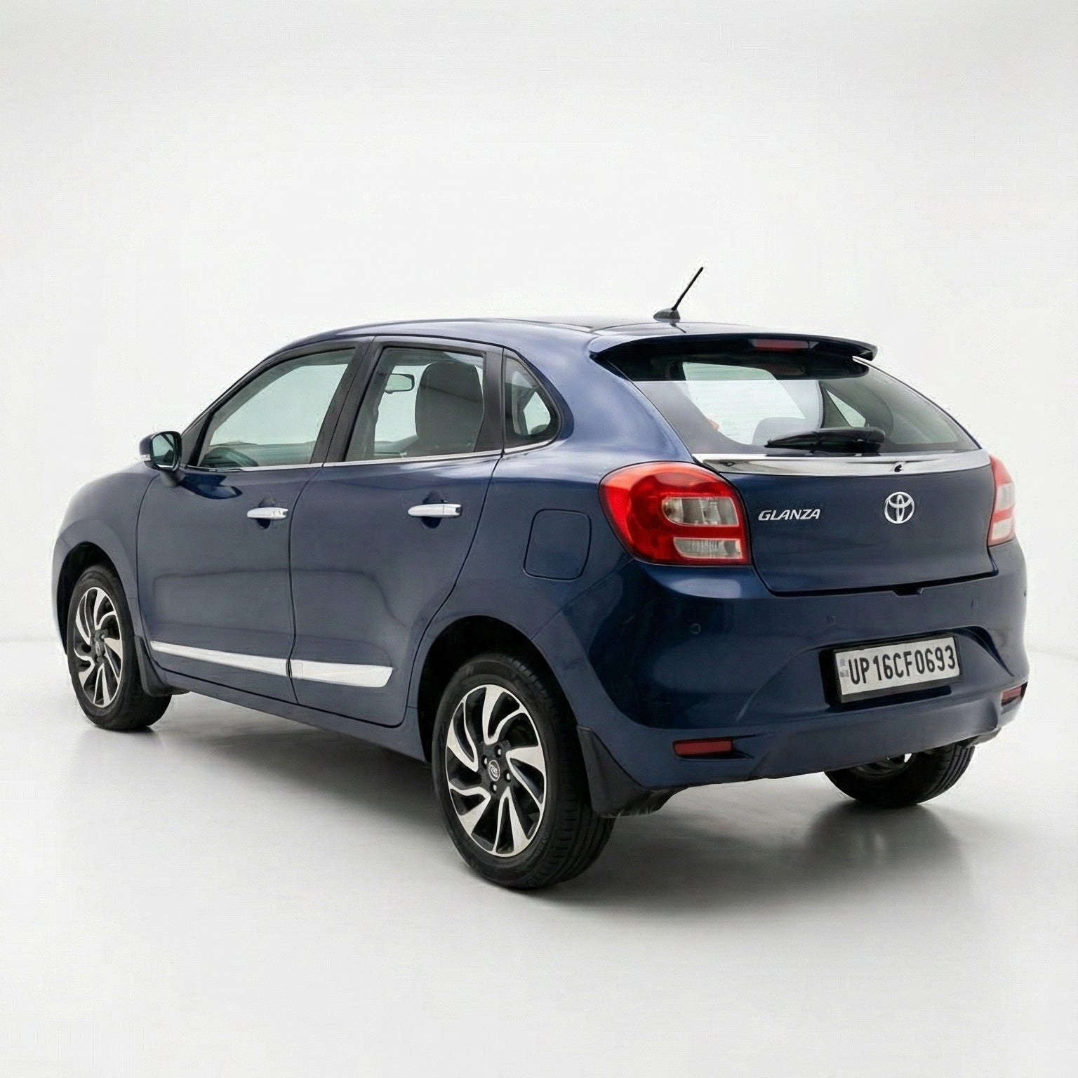 Blue Toyota car on a white background