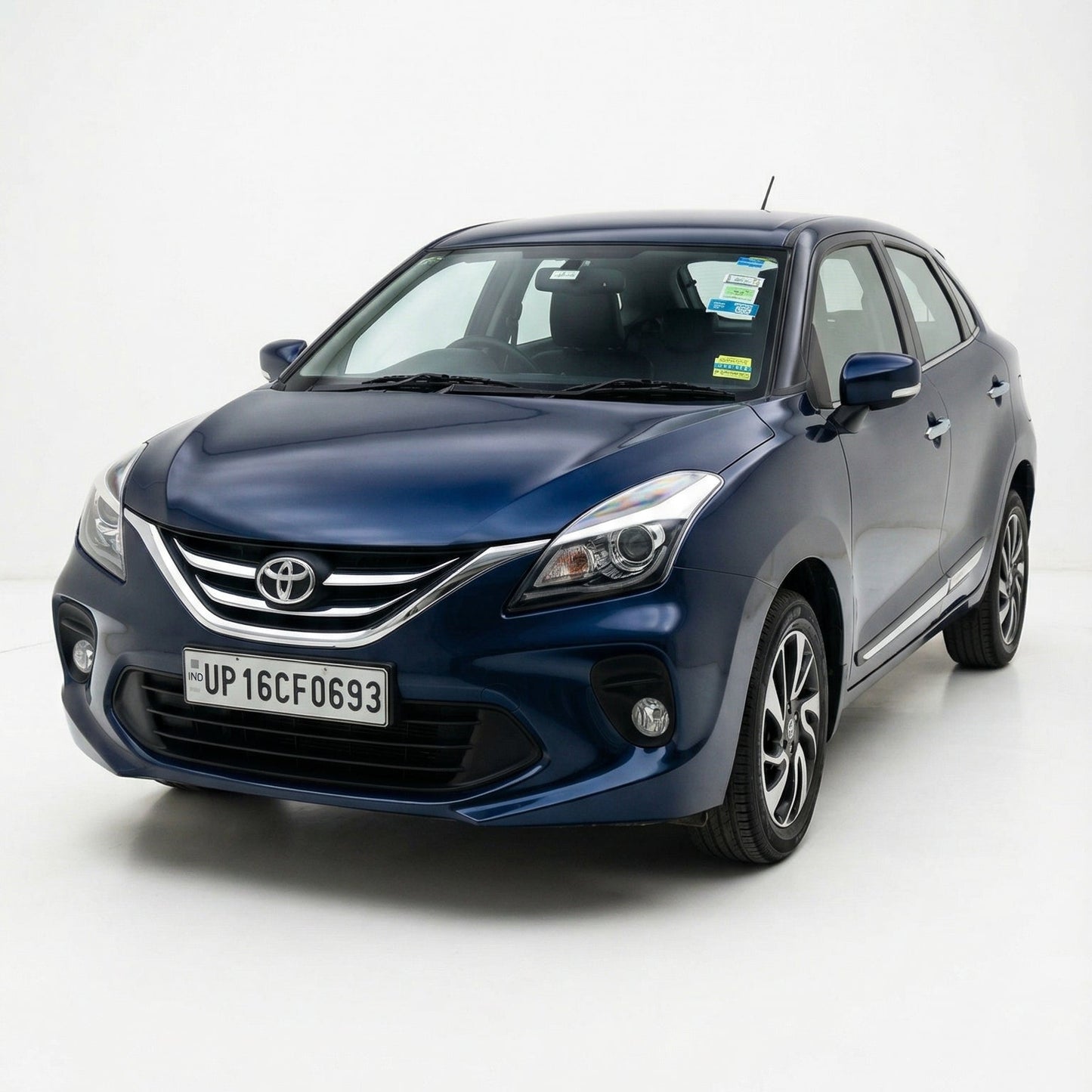 Blue Toyota car on a white background
