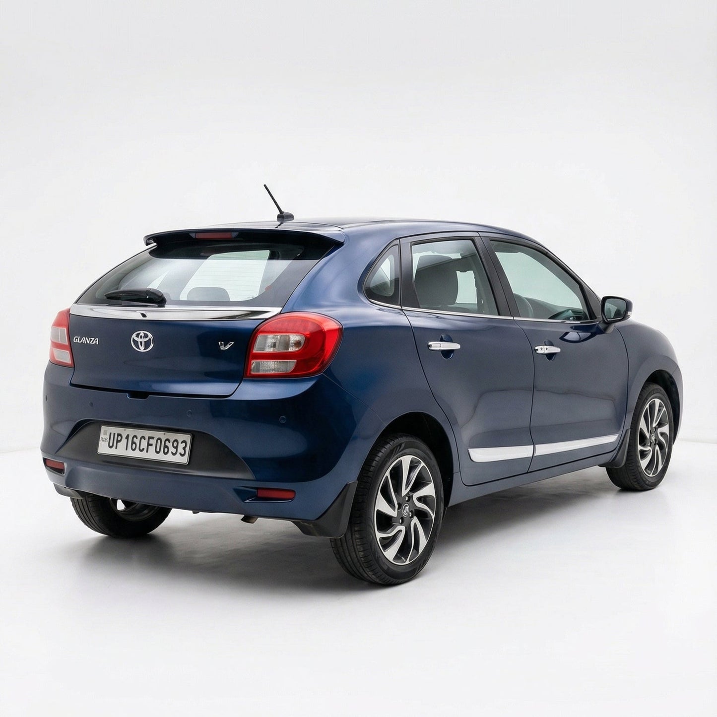 Blue Toyota car on a white background