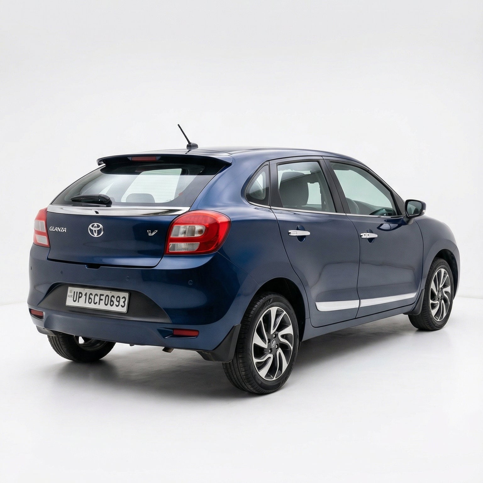 Blue Toyota car on a white background