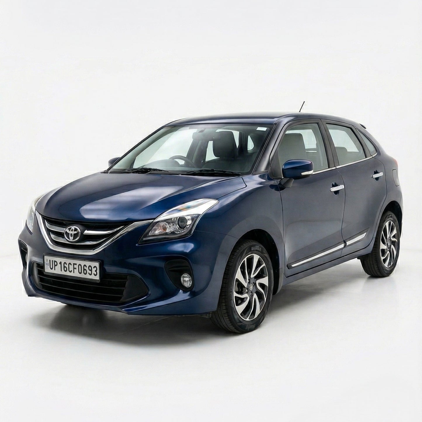 Blue Toyota car on a white background
