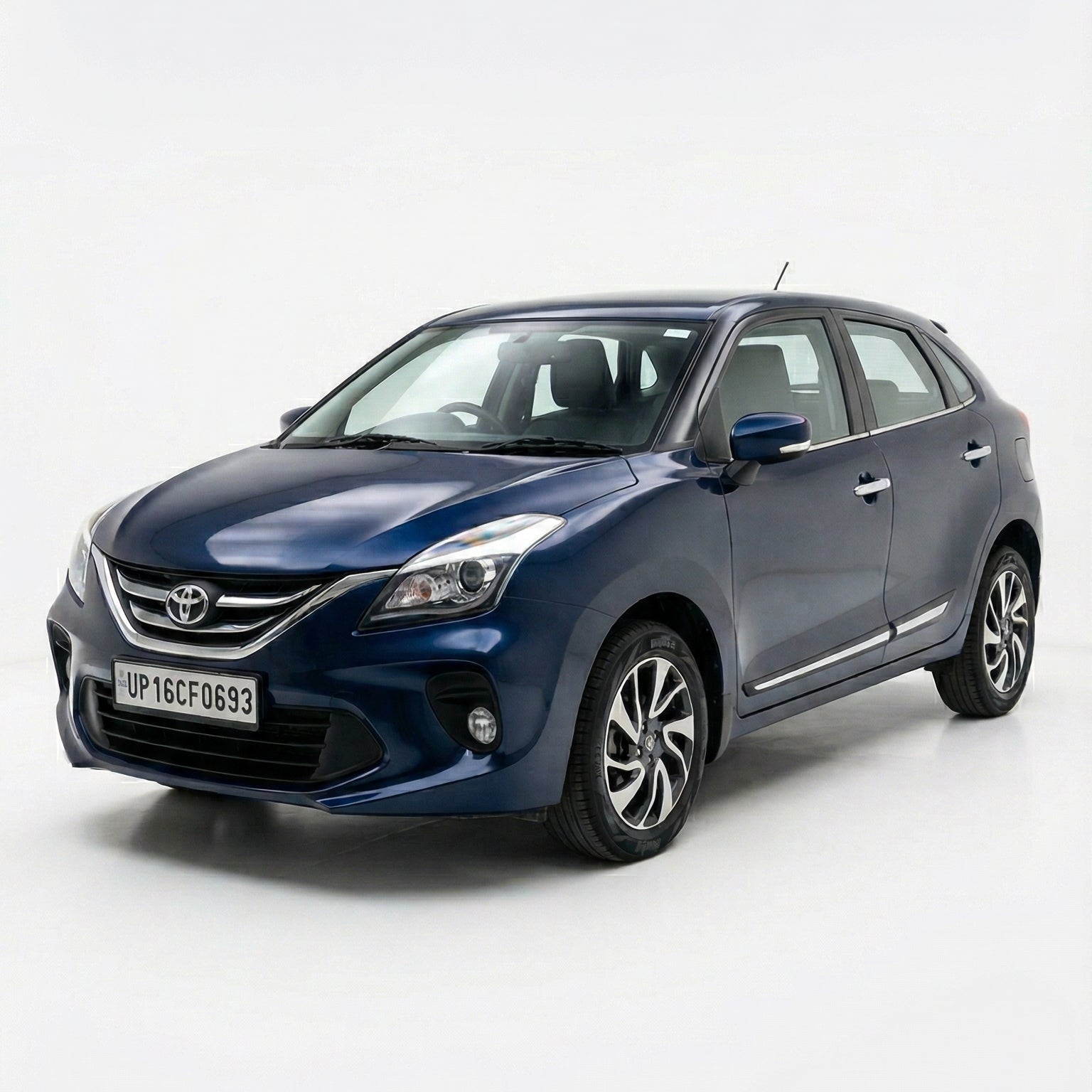 Blue Toyota car on a white background