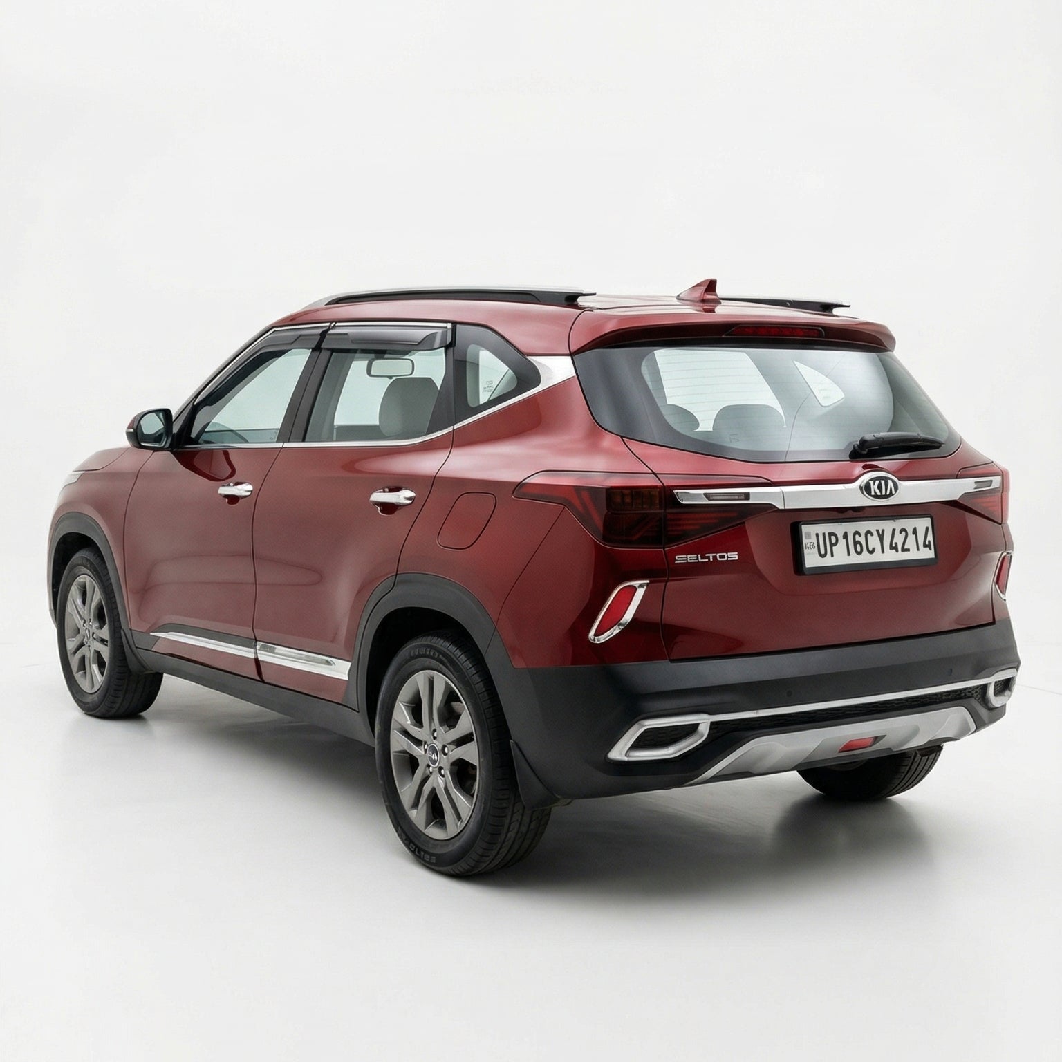 Red SUV on a white background