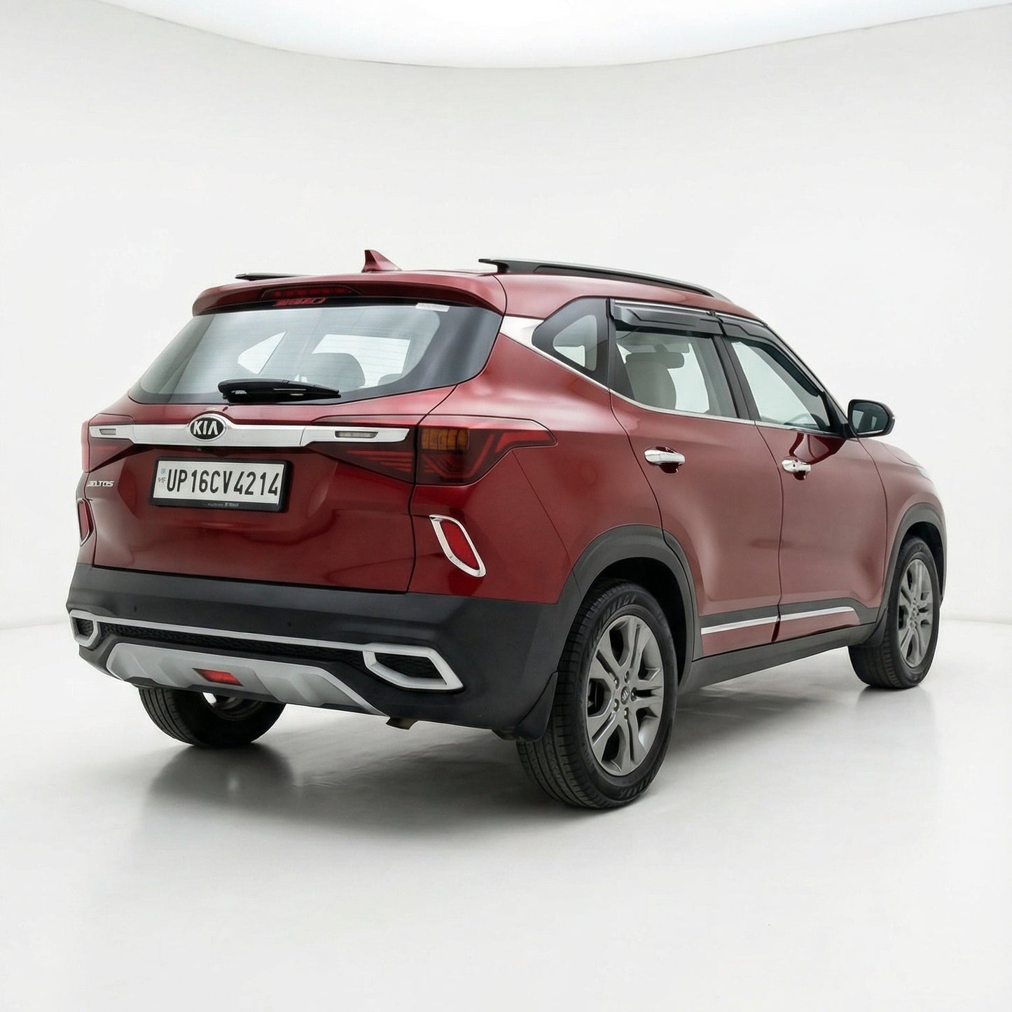 Red SUV on a white background