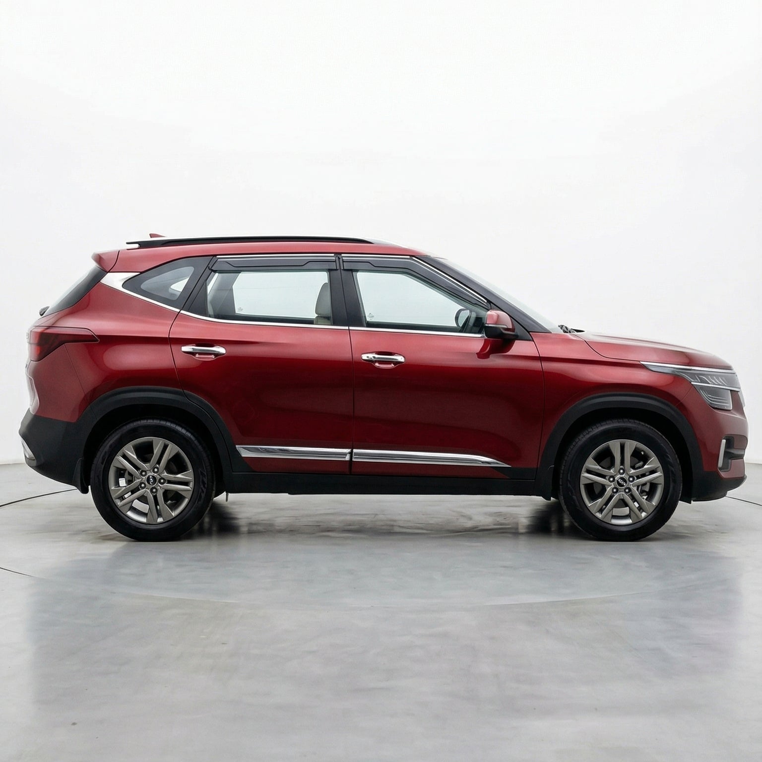 Red SUV on a white background
