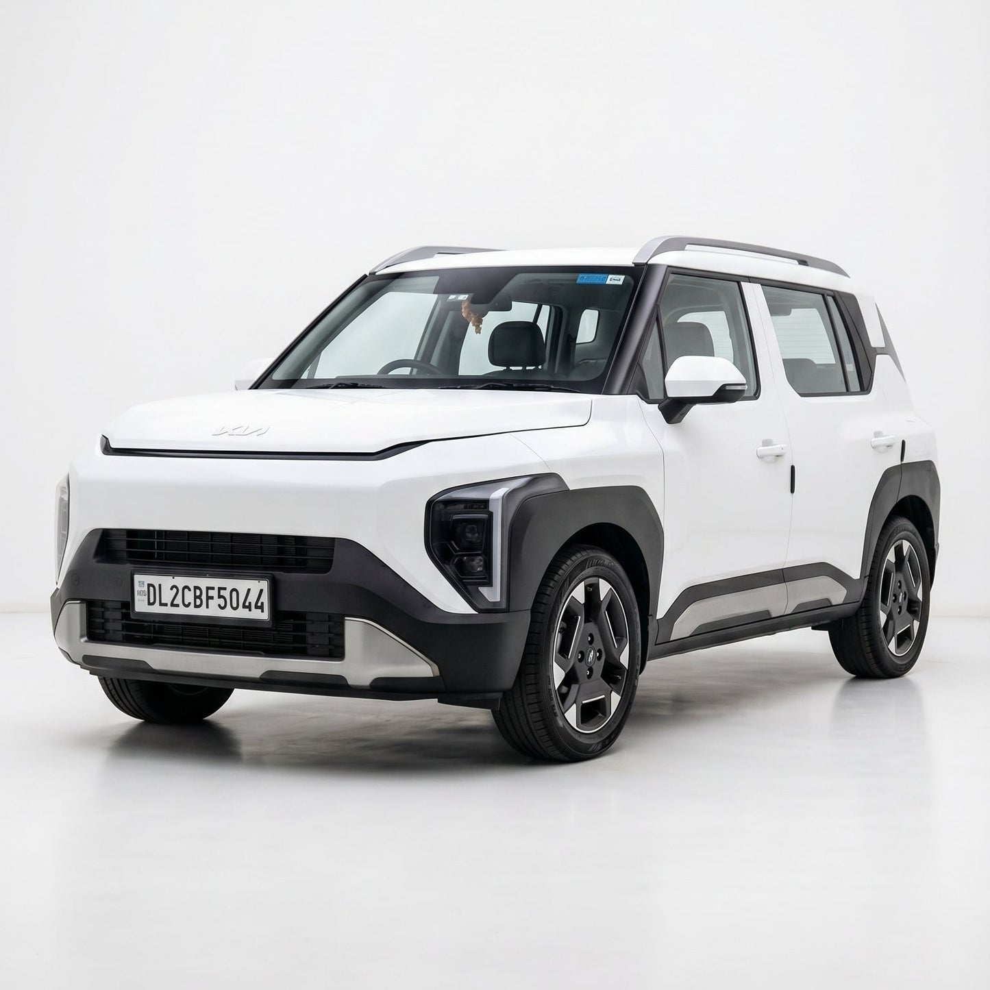White SUV with black accents on a white background