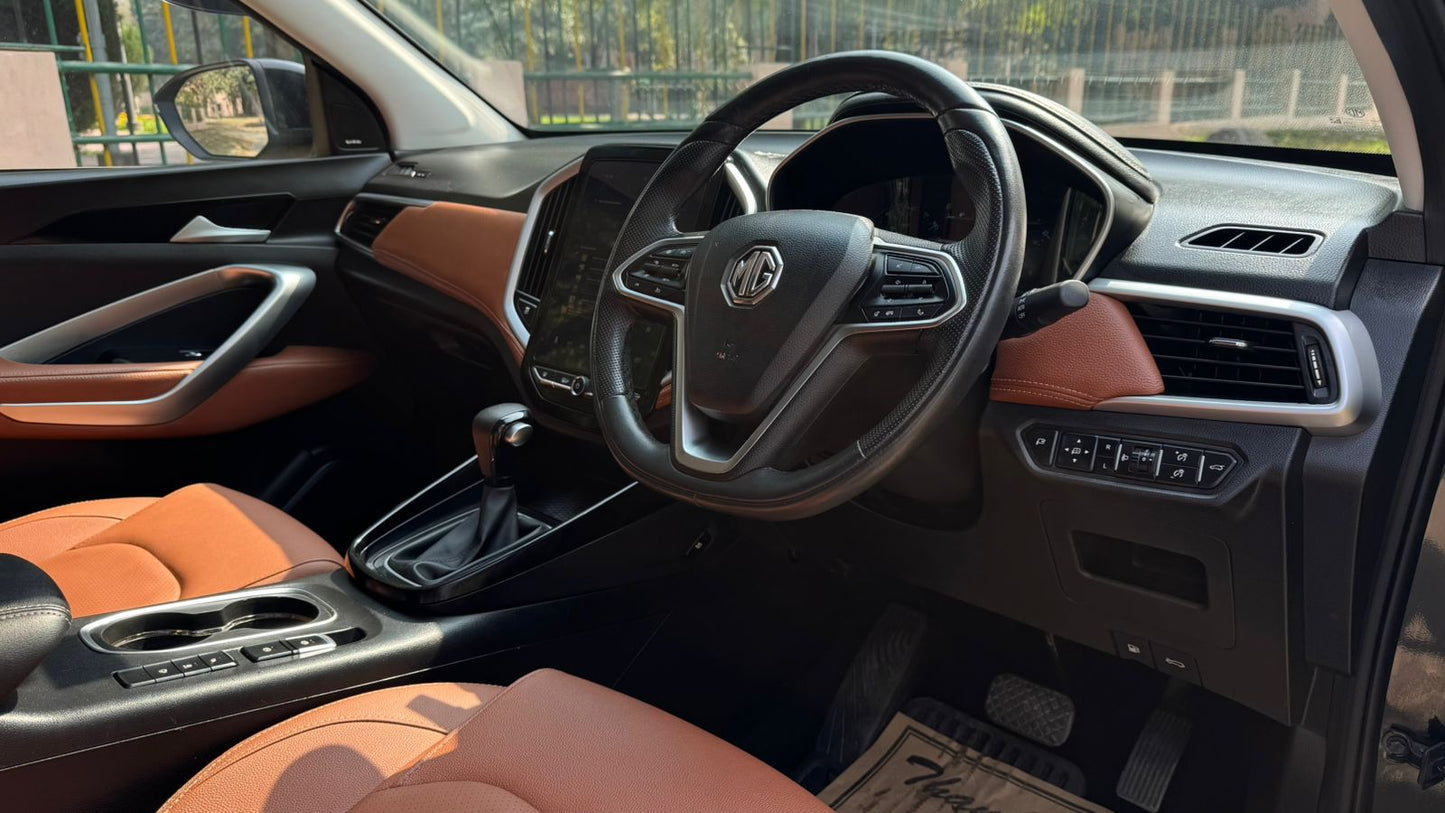 Car interior with steering wheel and dashboard