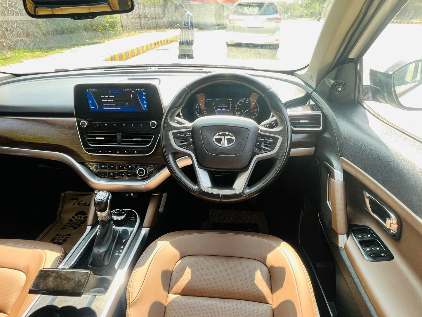 Car interior with Tata logo on steering wheel