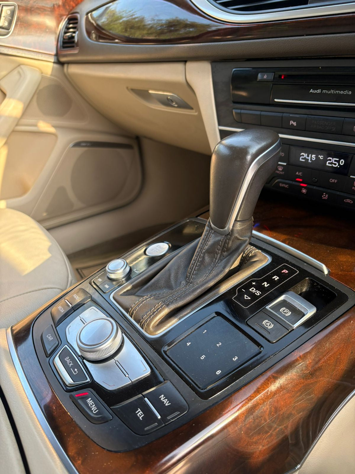 Car interior with gear shift and control panel