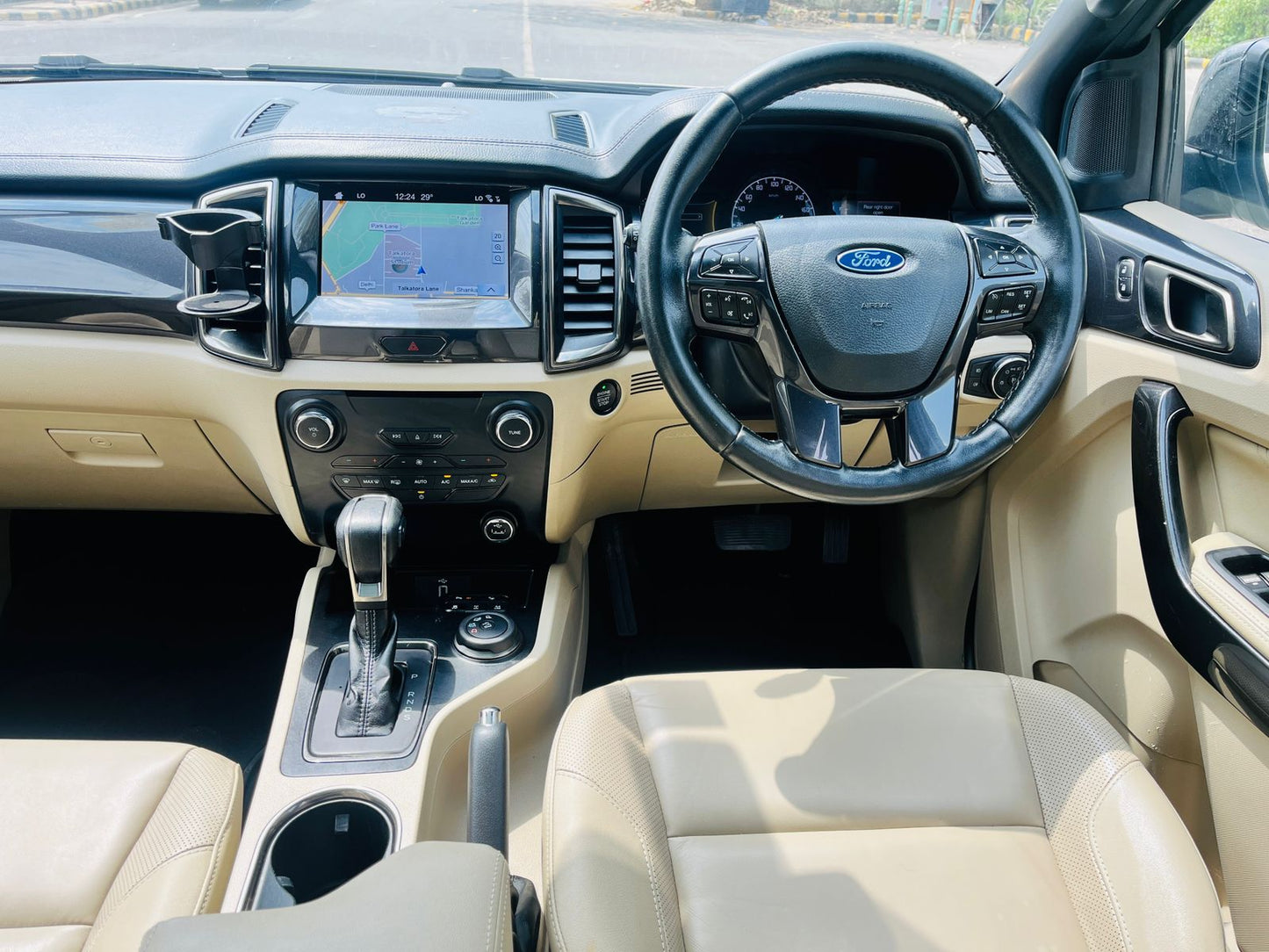 Car interior with steering wheel and dashboard in a Ford vehicle