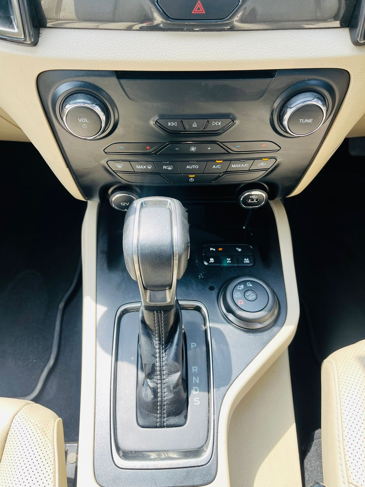 Car interior with gear shift and control panel