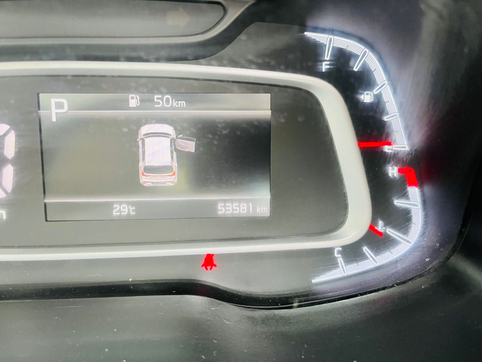 Car dashboard display with navigation system and fuel gauge