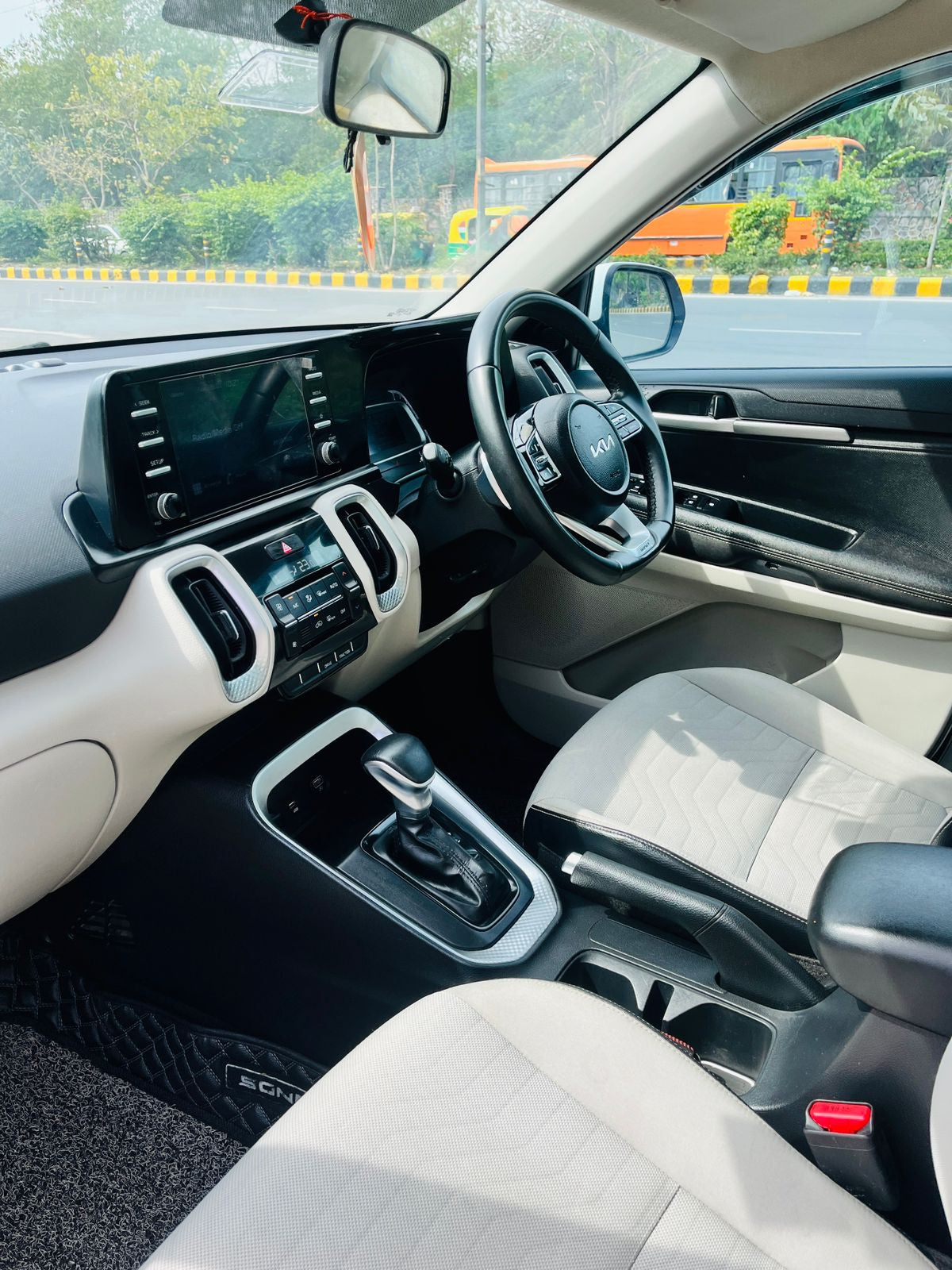 Car interior with dashboard and steering wheel visible