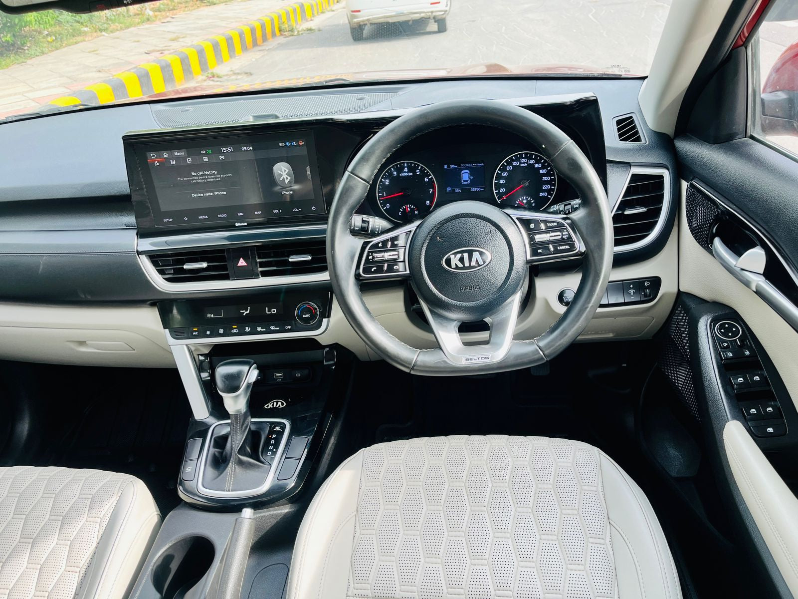 Car interior with steering wheel and dashboard of a Kia vehicle