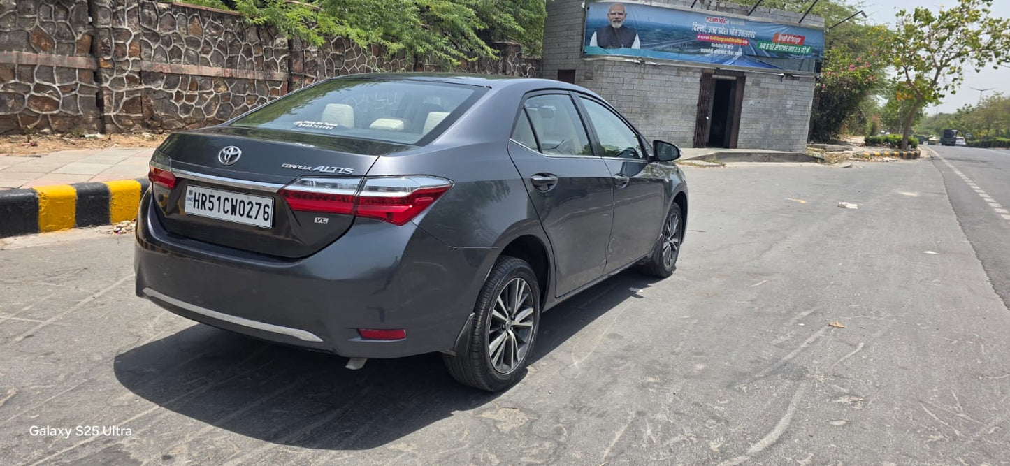 2018 Toyota Corolla Altis VL CVT Petrol | HR51 Registered | 50,000 KM Driven | Grey | ₹9.90 Lakh