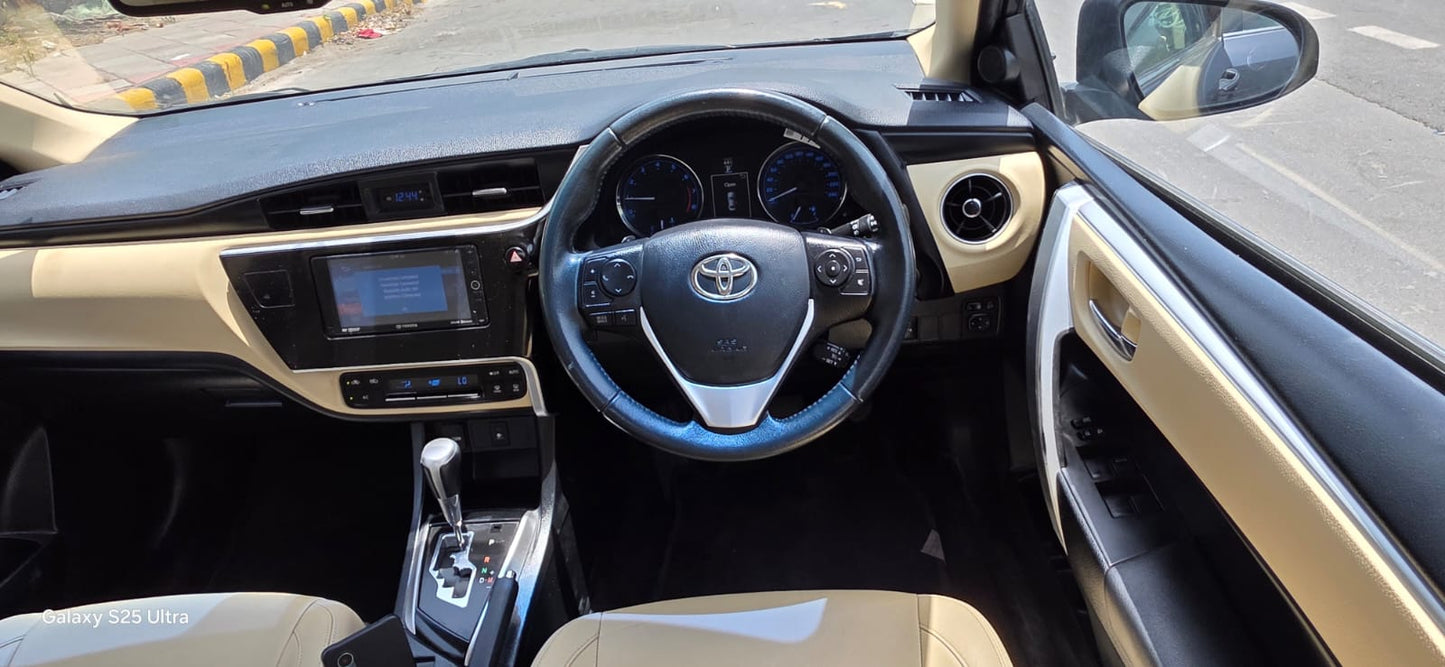 2018 Toyota Corolla Altis VL CVT Petrol | HR51 Registered | 50,000 KM Driven | Grey | ₹9.90 Lakh